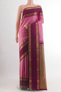 Pink Kanchipuram Silk Saree with Checked design on the body and Zari Border.  displayed on a mannequin