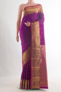 Pure Silk Purple Kanchipuram Saree with Zari Butta on the body and Zari Border.  displayed on a mannequin