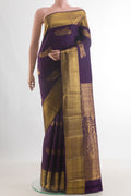 Pure Silk Purple Kanchipuram Saree with Zari Butta on the body and Zari Border.  displayed on a mannequin