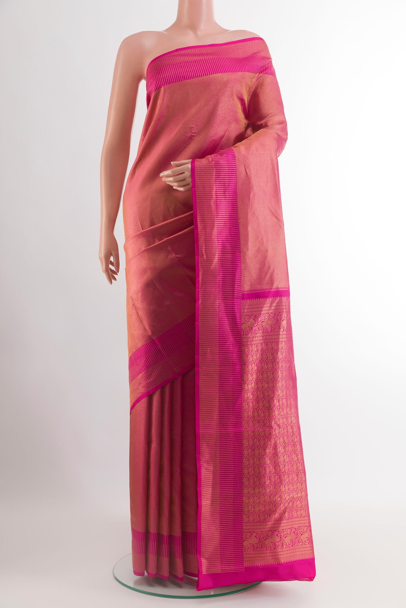 Pink Kanchipuram Silk Saree with Zari Brocade on the body and Zari Border.  displayed on a mannequin