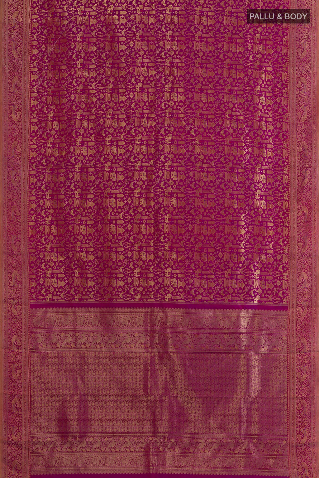 Flat view of Magenta Kanchipuram Silk Saree with Zari Brocade on the body and Zari Border. 