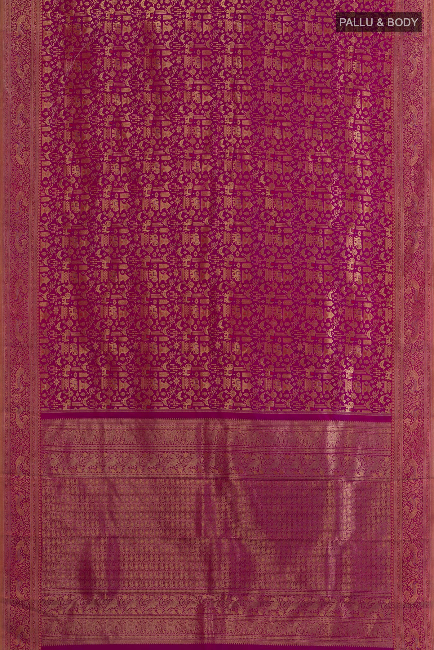 Flat view of Magenta Kanchipuram Silk Saree with Zari Brocade on the body and Zari Border. 