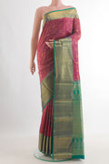 Pure Silk Pink Kanchipuram Saree with Zari Brocade on the body and Zari Border.  displayed on a mannequin