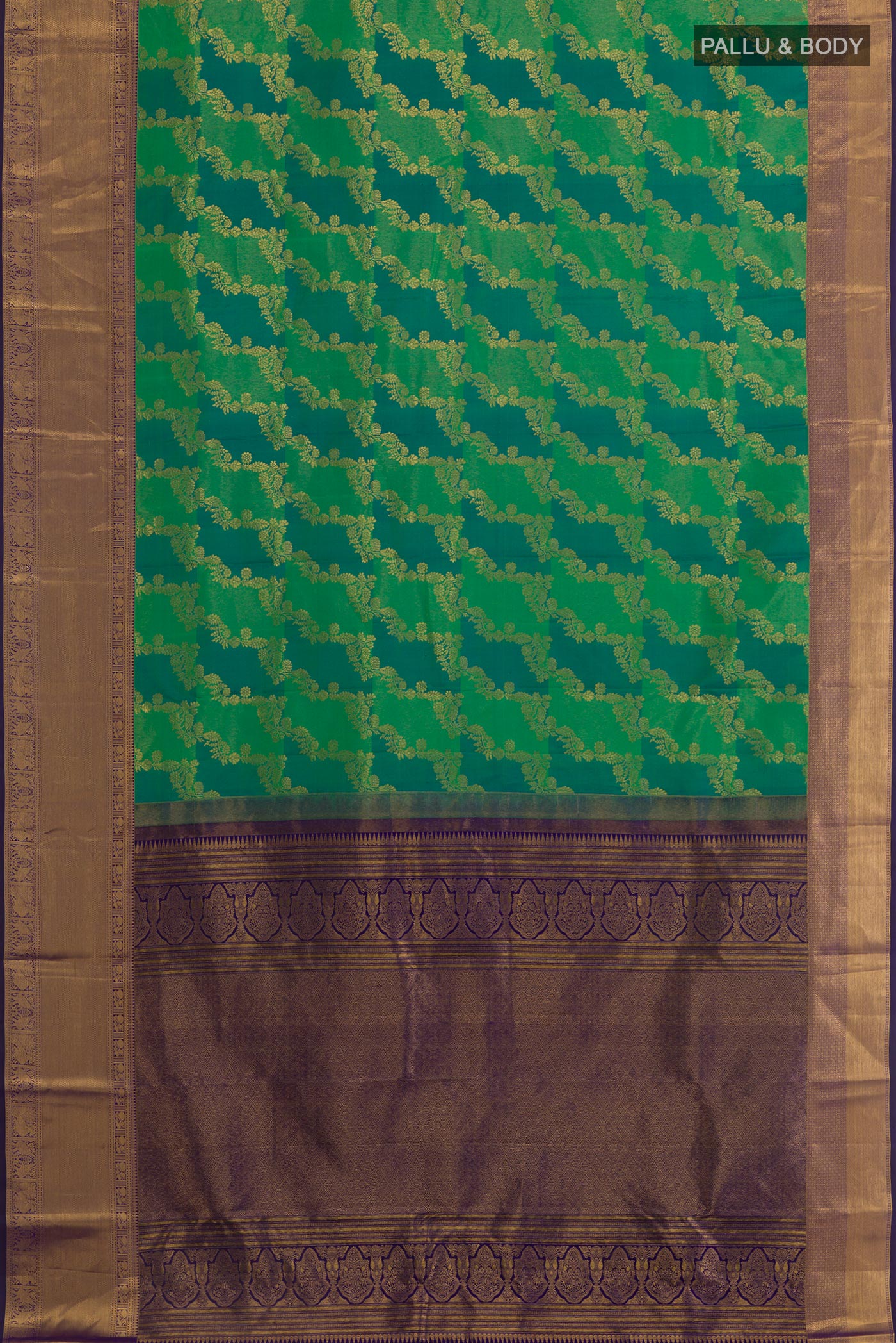 Flat view of Green Kanchipuram Silk Saree with Zari Brocade on the body and Zari Border. 