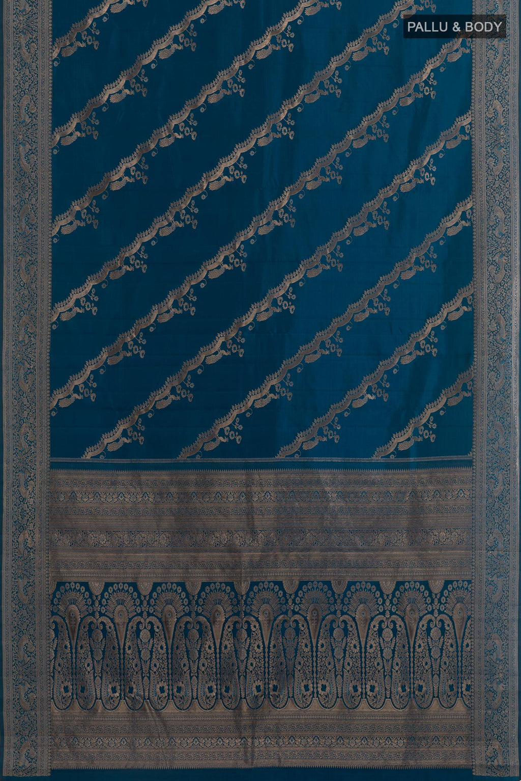 Flat view of Blue Kanjivaram Silk Saree with Zari Butta on the body and Zari Border. 