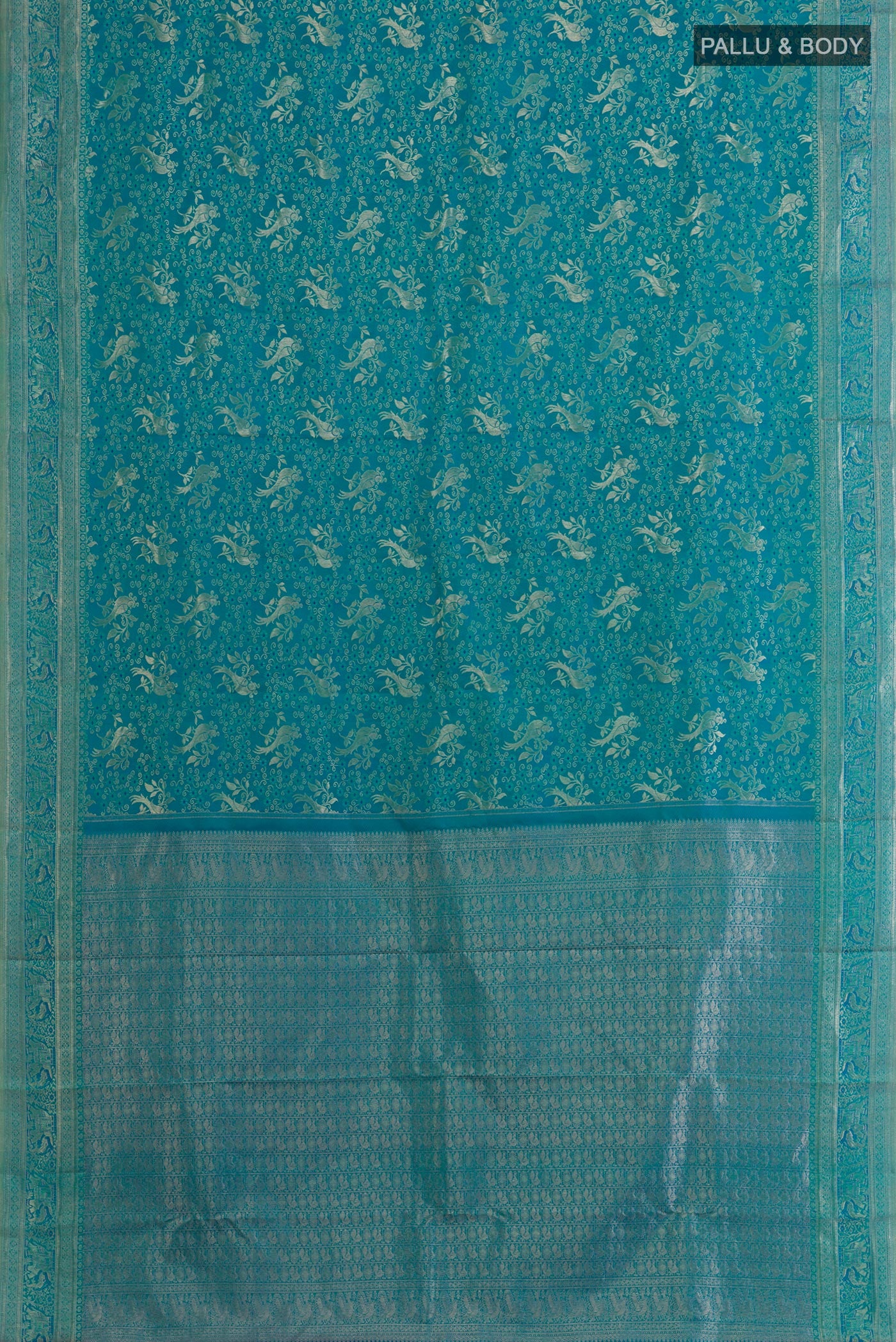 Flat view of Peacock Blue Kanjivaram Silk Saree with Zari Brocade on the body and Zari Border. 