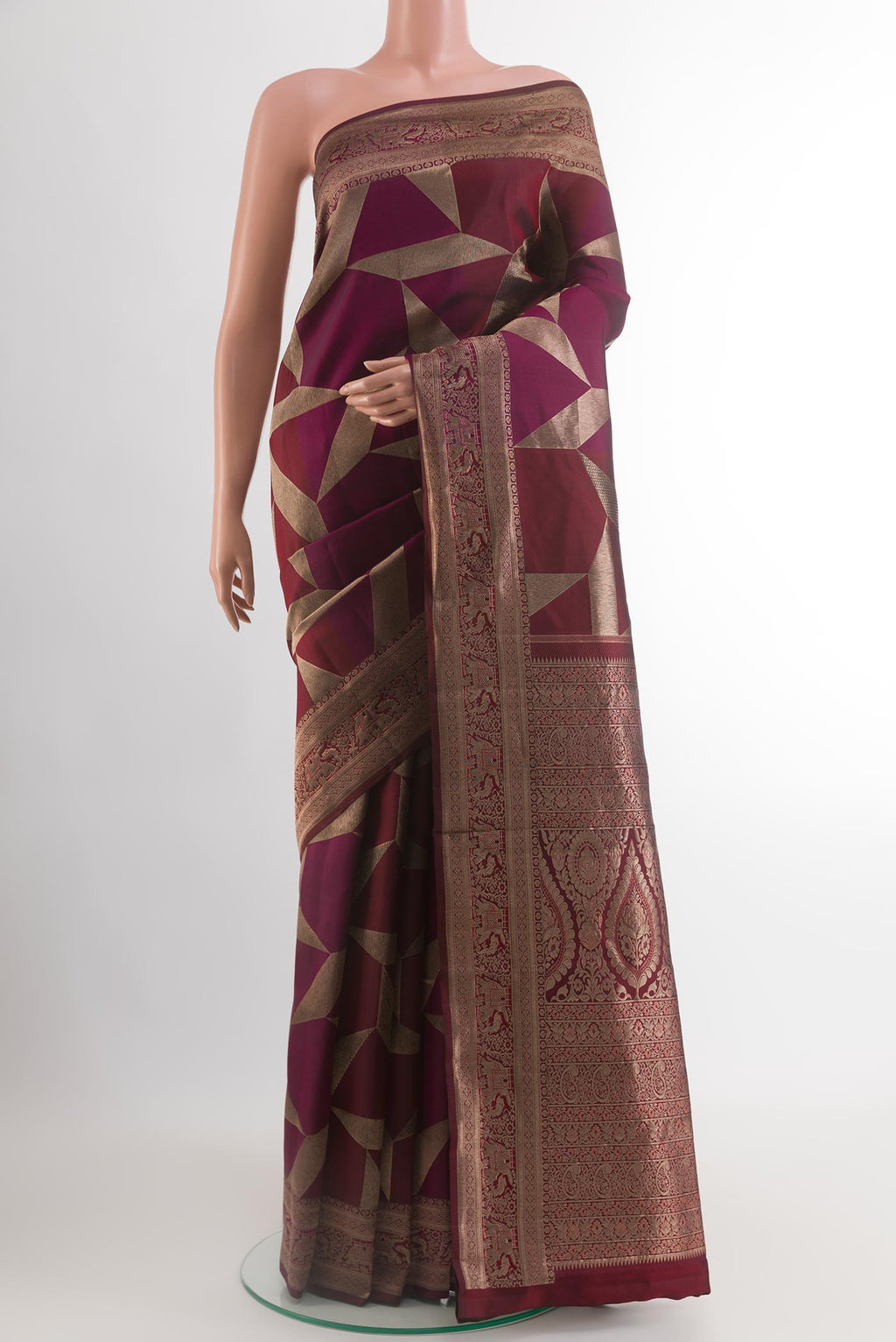 Multi Color Kanjivaram Silk Saree with Zari Brocade on the body and Zari Border.  displayed on a mannequin