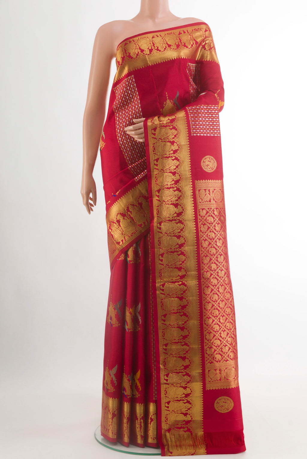 Red Kanjivaram Silk Saree with Zari Butta on the body and Zari Border.  displayed on a mannequin