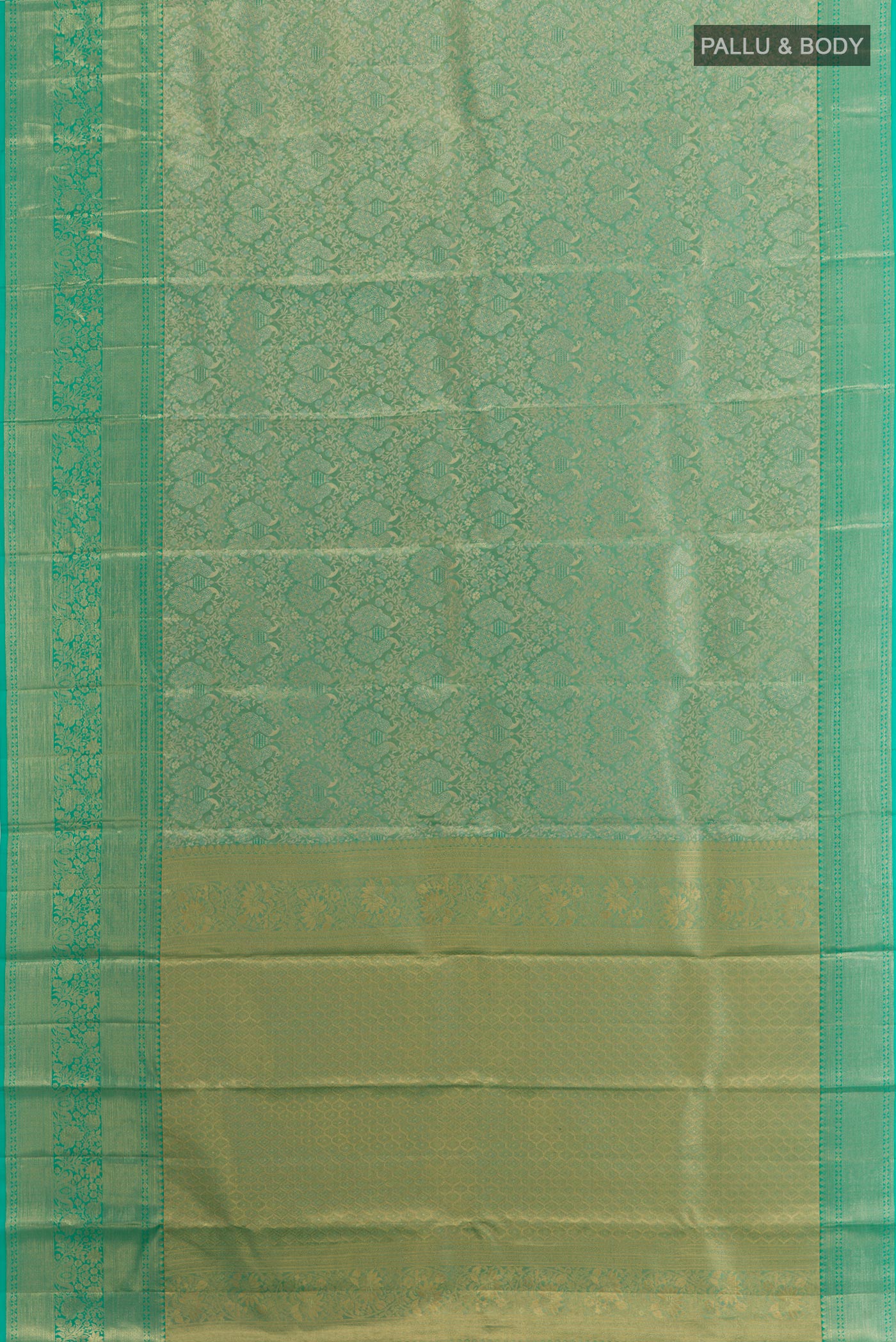 Flat view of Sea Green Dual Tone Kanchipuram Tissue Silk Saree with Zari Brocade on the body and Zari Border. 
