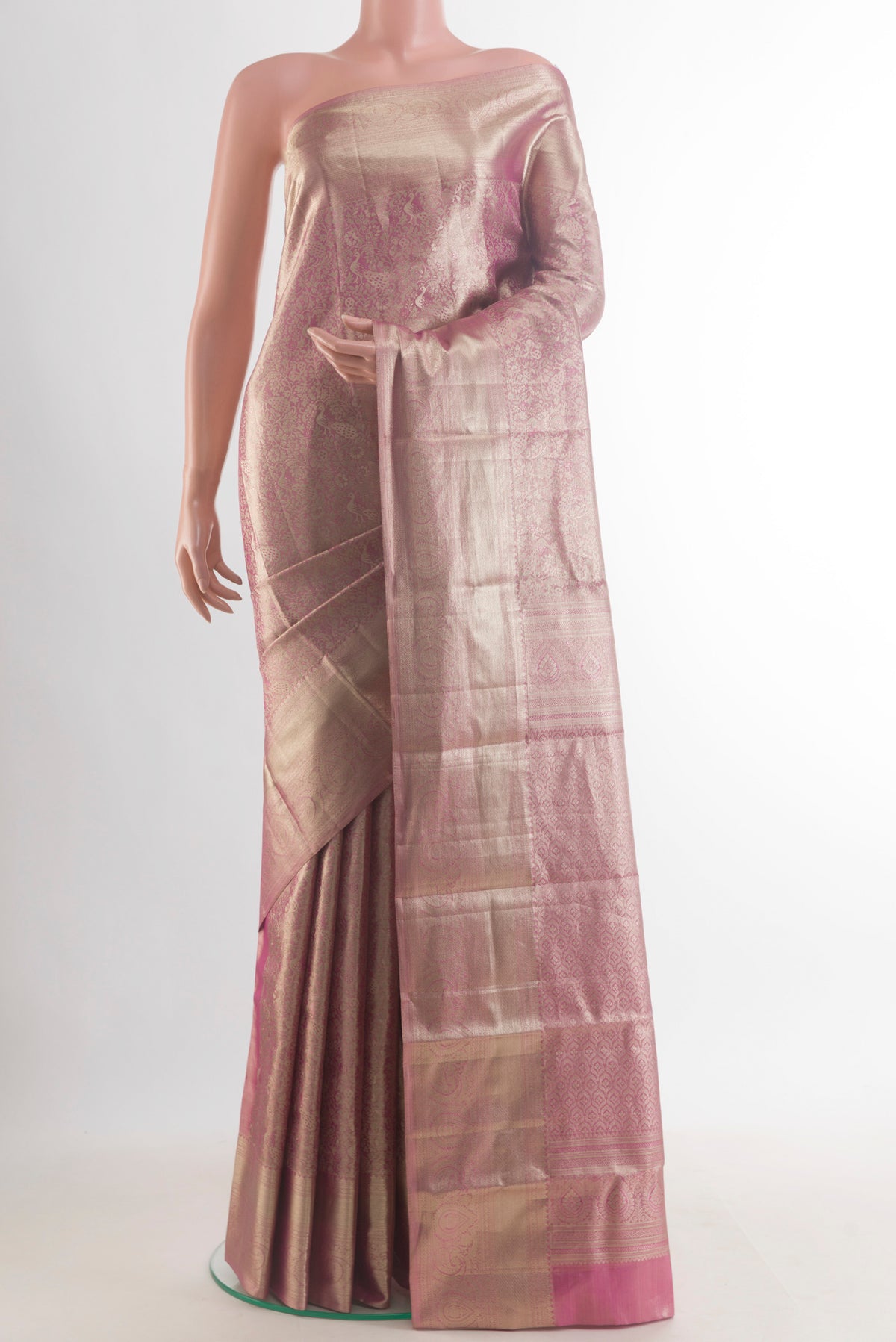 Rose Gold Dual Tone Kanchipuram Tissue Saree with Zari Brocade on the body and Zari Border.  displayed on a mannequin