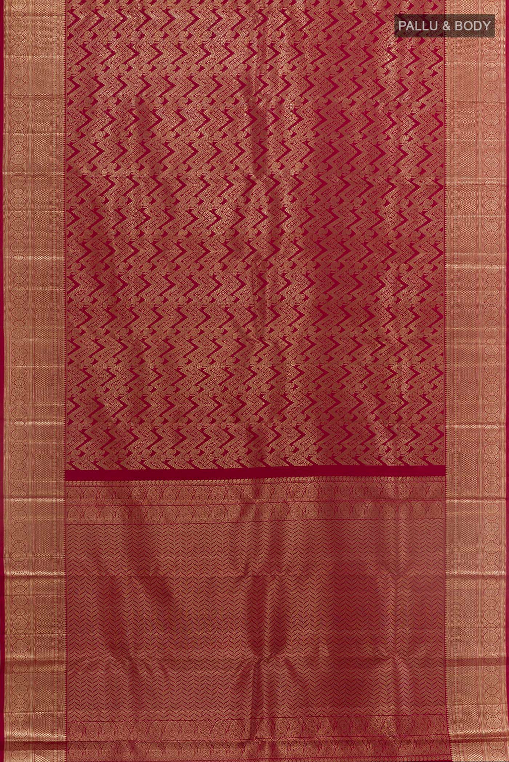 Flat view of Maroon Kanchipuram Silk Saree with Zari Brocade on the body and Zari Border. 