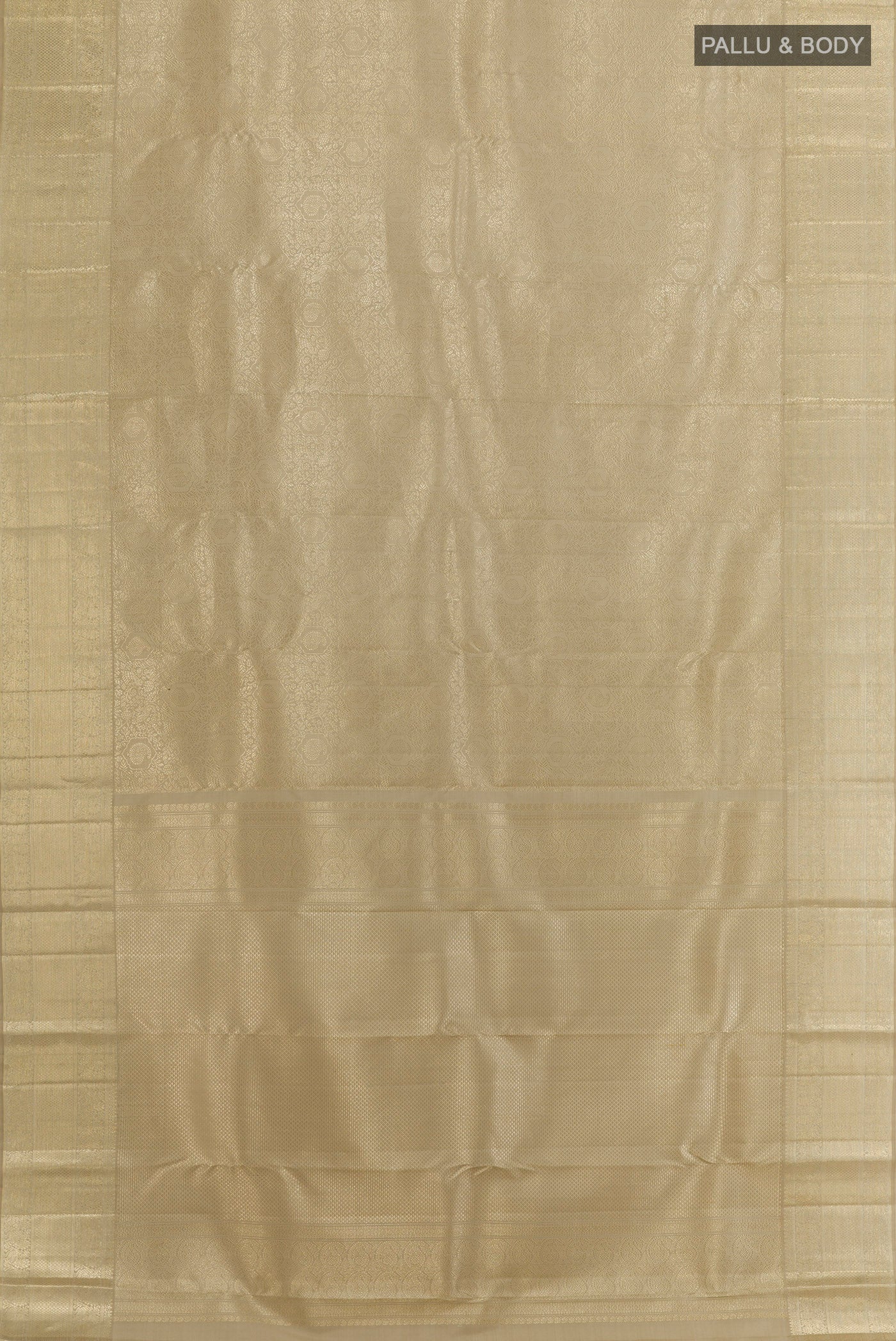 Flat view of Beige Kanchipuram Silk Saree with Zari Brocade on the body and Zari Border. 