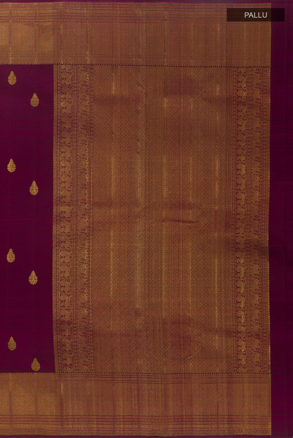 Close up image of the pallu of Purple Kanchipuram Silk Saree with Zari Butta on the body and Zari Border. 