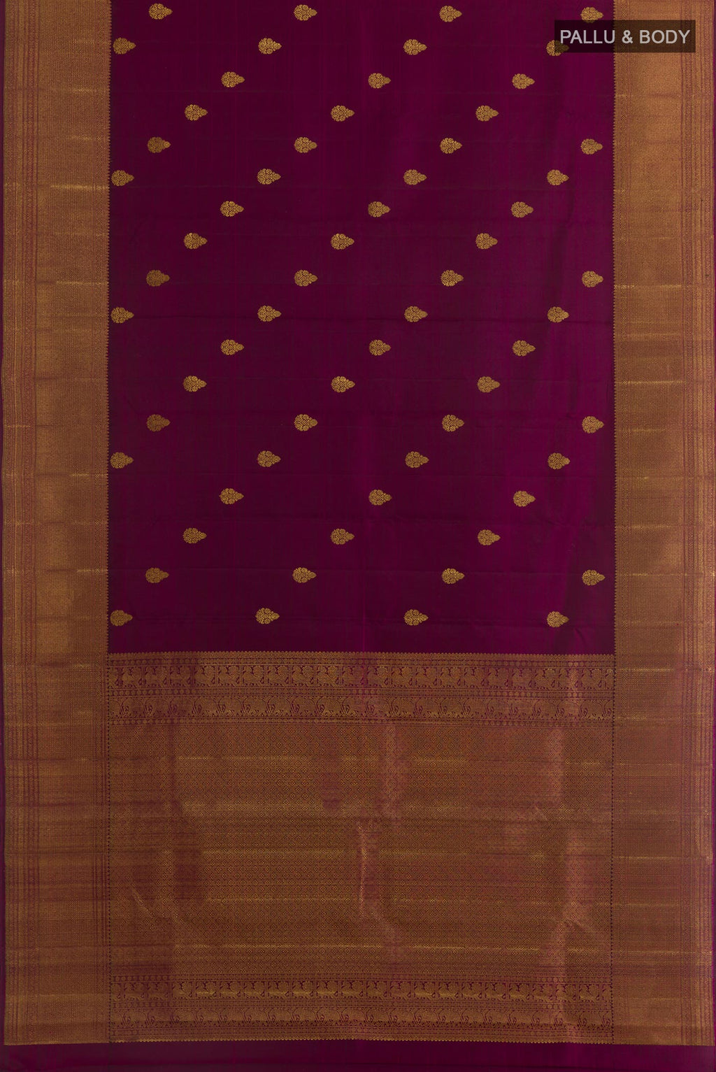 Flat view of Purple Kanchipuram Silk Saree with Zari Butta on the body and Zari Border. 