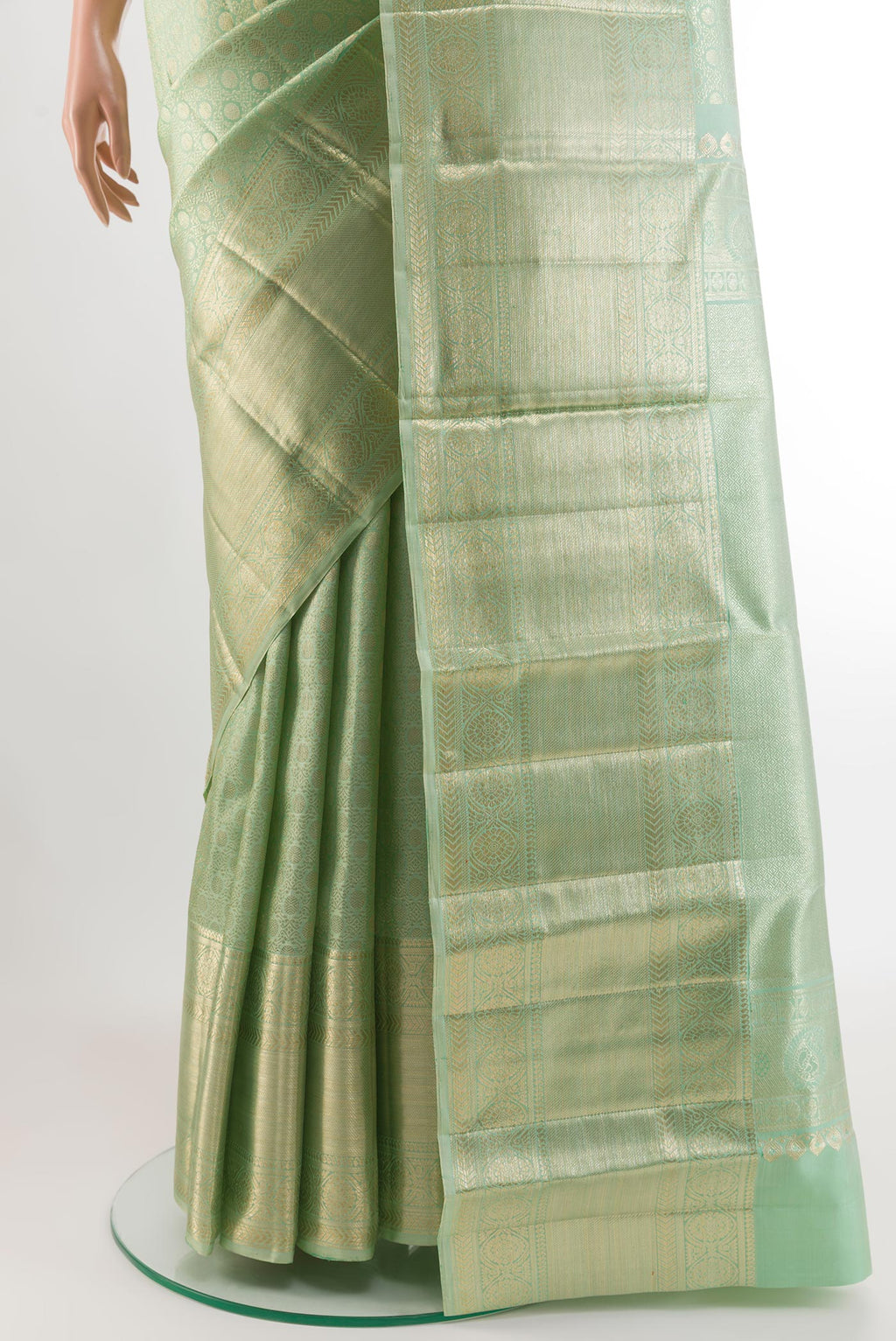 Pleats and pallu of Mint Green Kanchipuram Tissue Silk Saree with Zari Brocade on the body and Zari Border. 