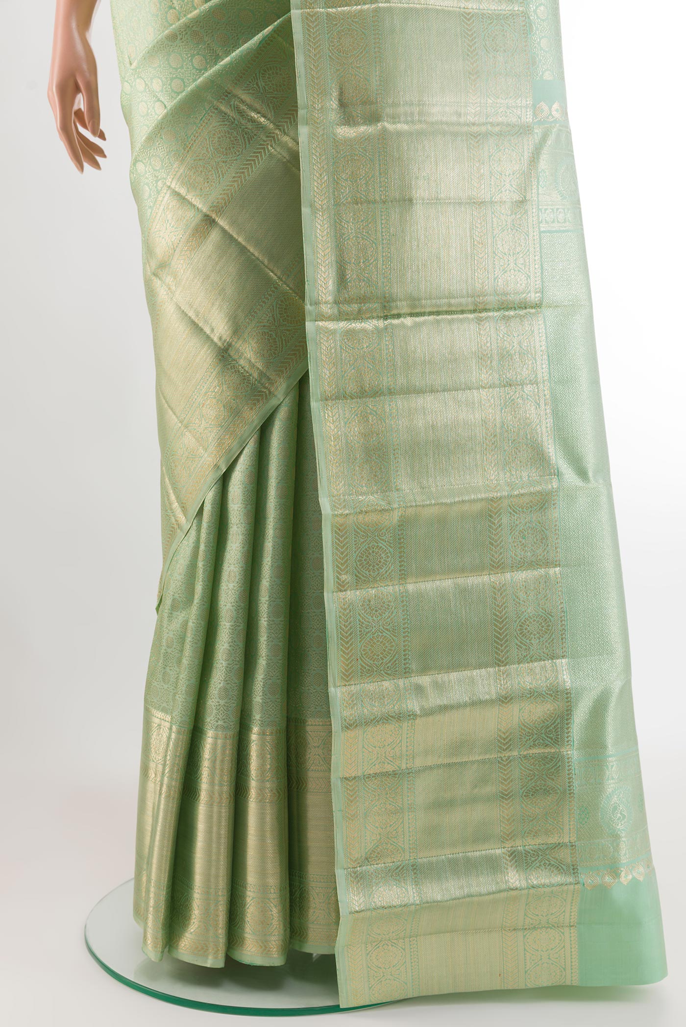 Pleats and pallu of Mint Green Kanchipuram Tissue Silk Saree with Zari Brocade on the body and Zari Border. 