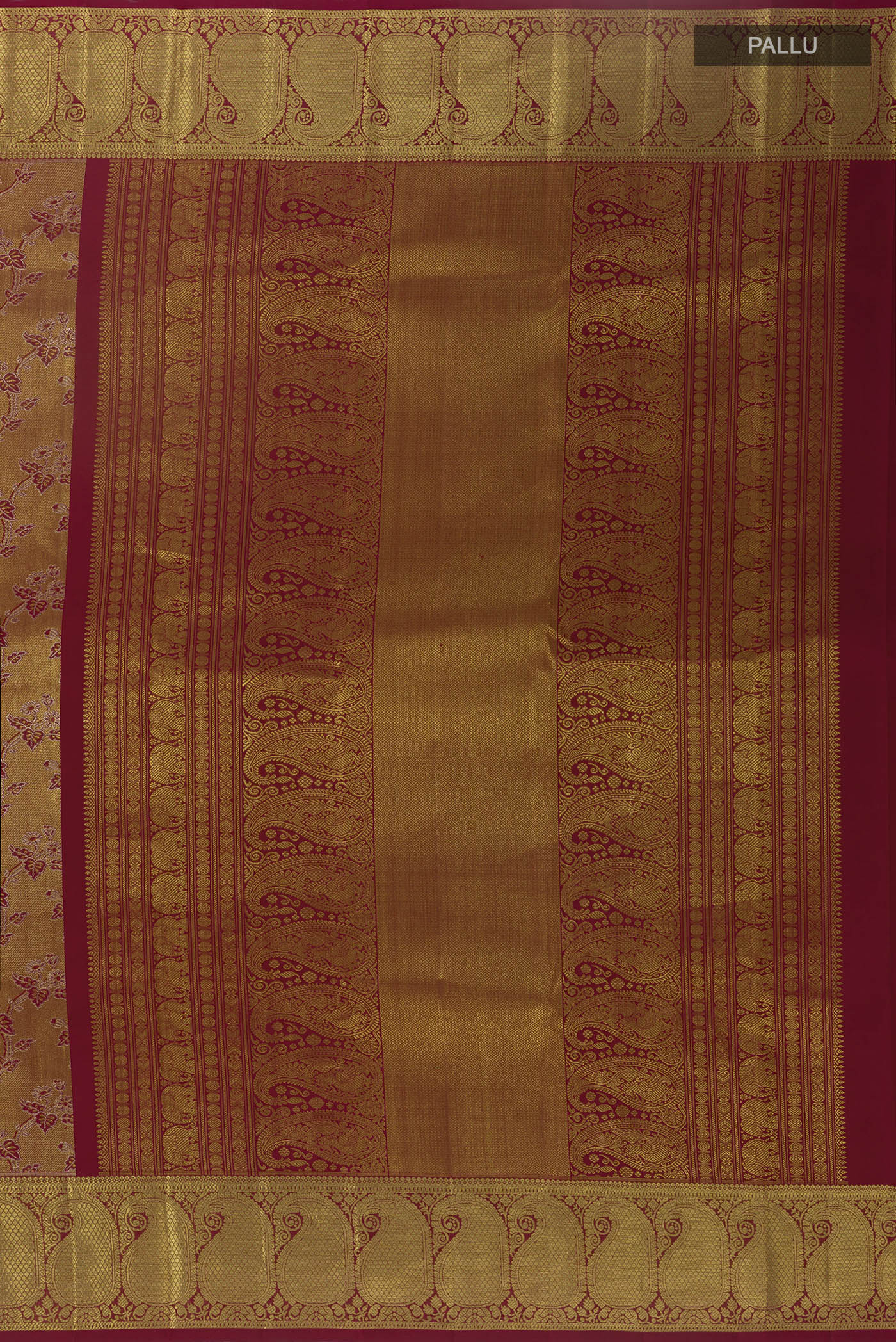 Close up image of the pallu of Maroon Kanchipuram Tissue Silk Saree with Zari Brocade on the body and Zari Border. 
