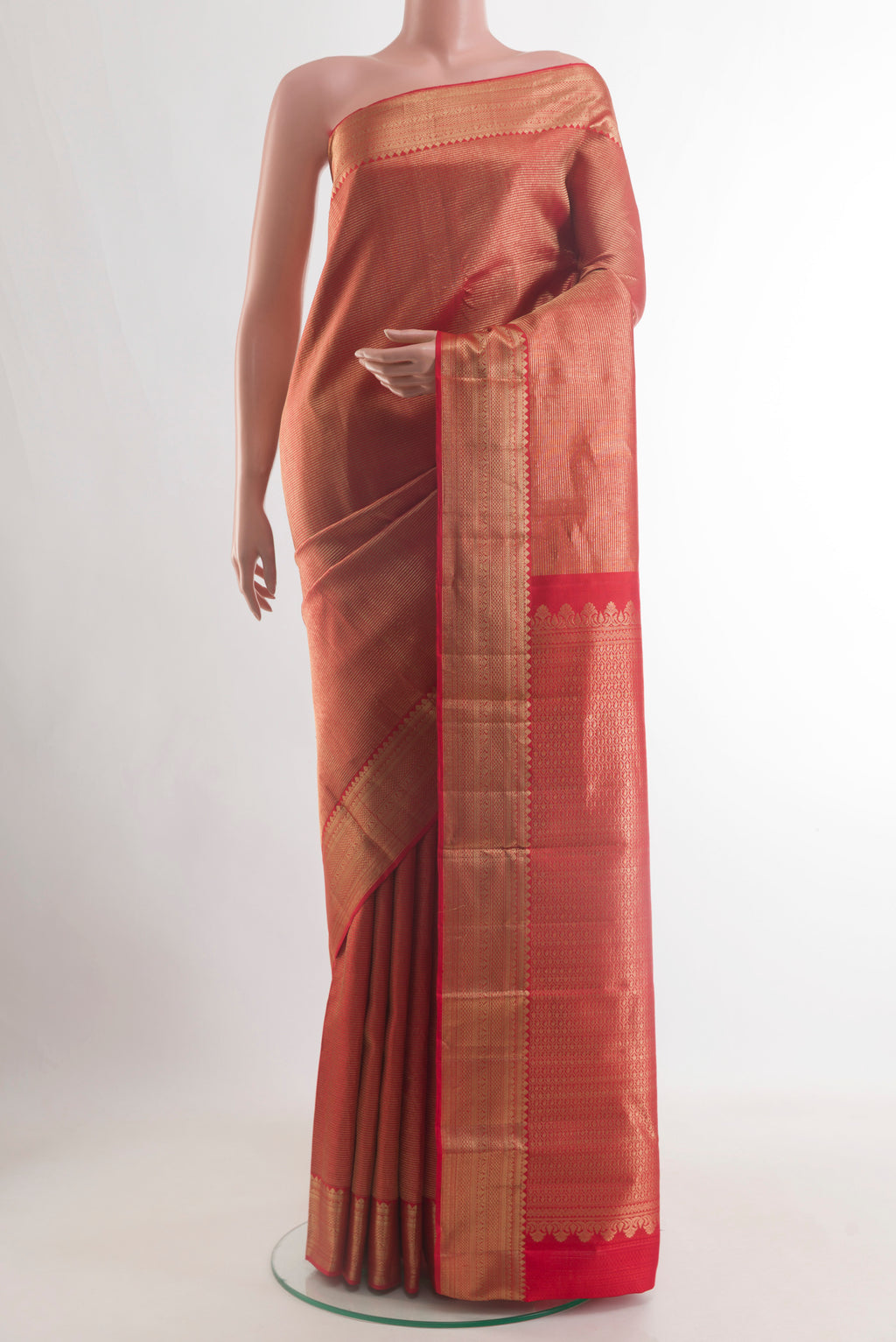 Red Kanjivaram Silk Saree with Zari Brocade on the body and Zari Border.  displayed on a mannequin