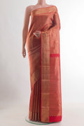 Red Kanjivaram Silk Saree with Zari Brocade on the body and Zari Border.  displayed on a mannequin