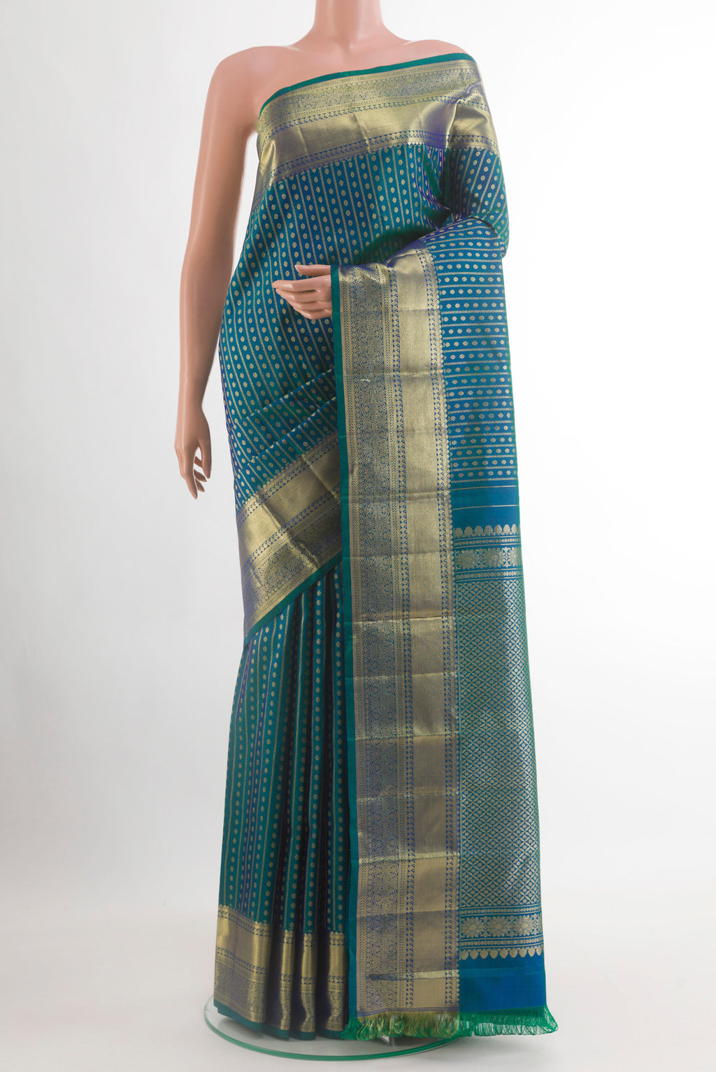 Peacock Blue Kanjivaram Silk Saree with Stripes on the body and Zari Border.  displayed on a mannequin