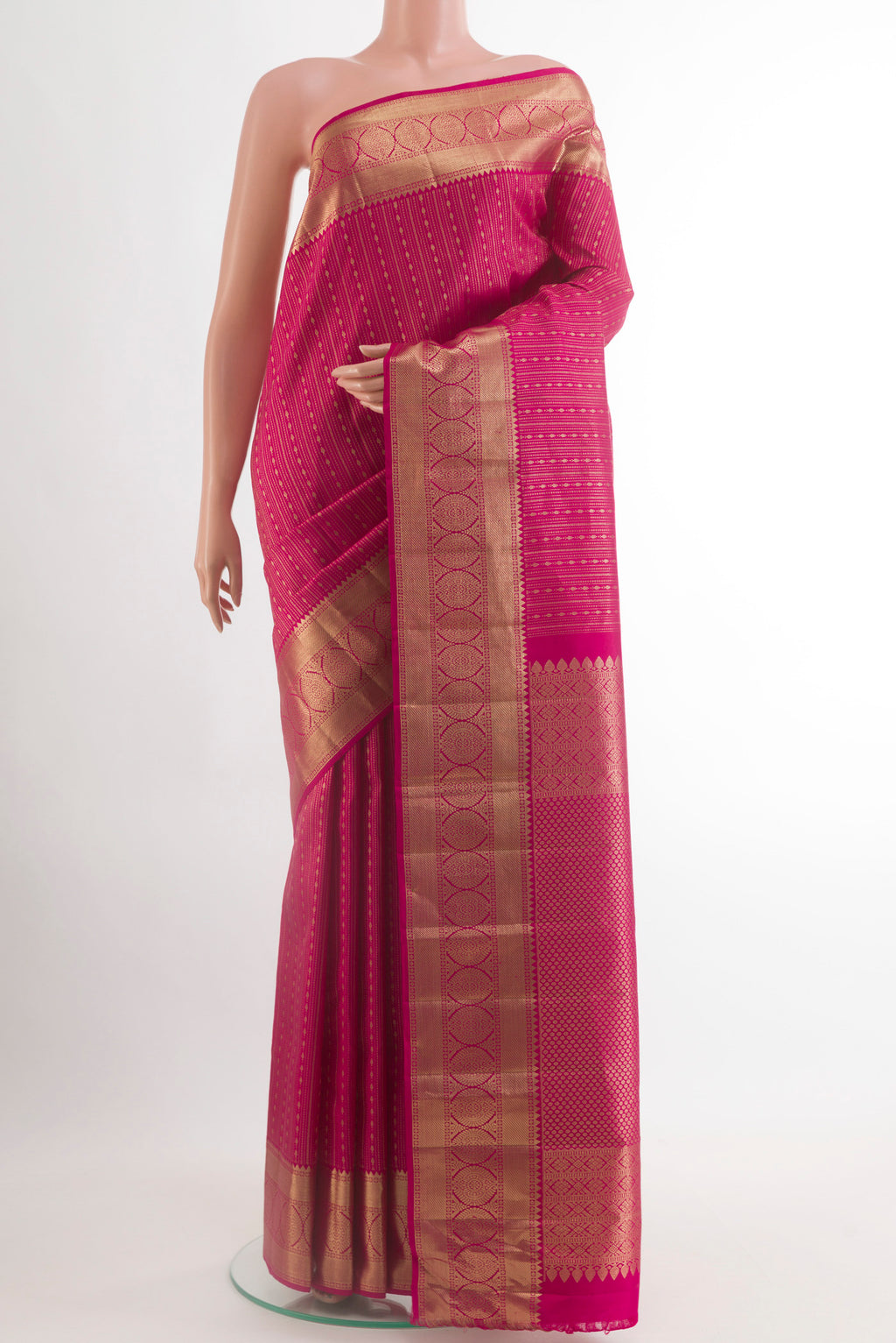 Pink Kanjivaram Silk Saree with Zari Brocade on the body and Zari Border.  displayed on a mannequin