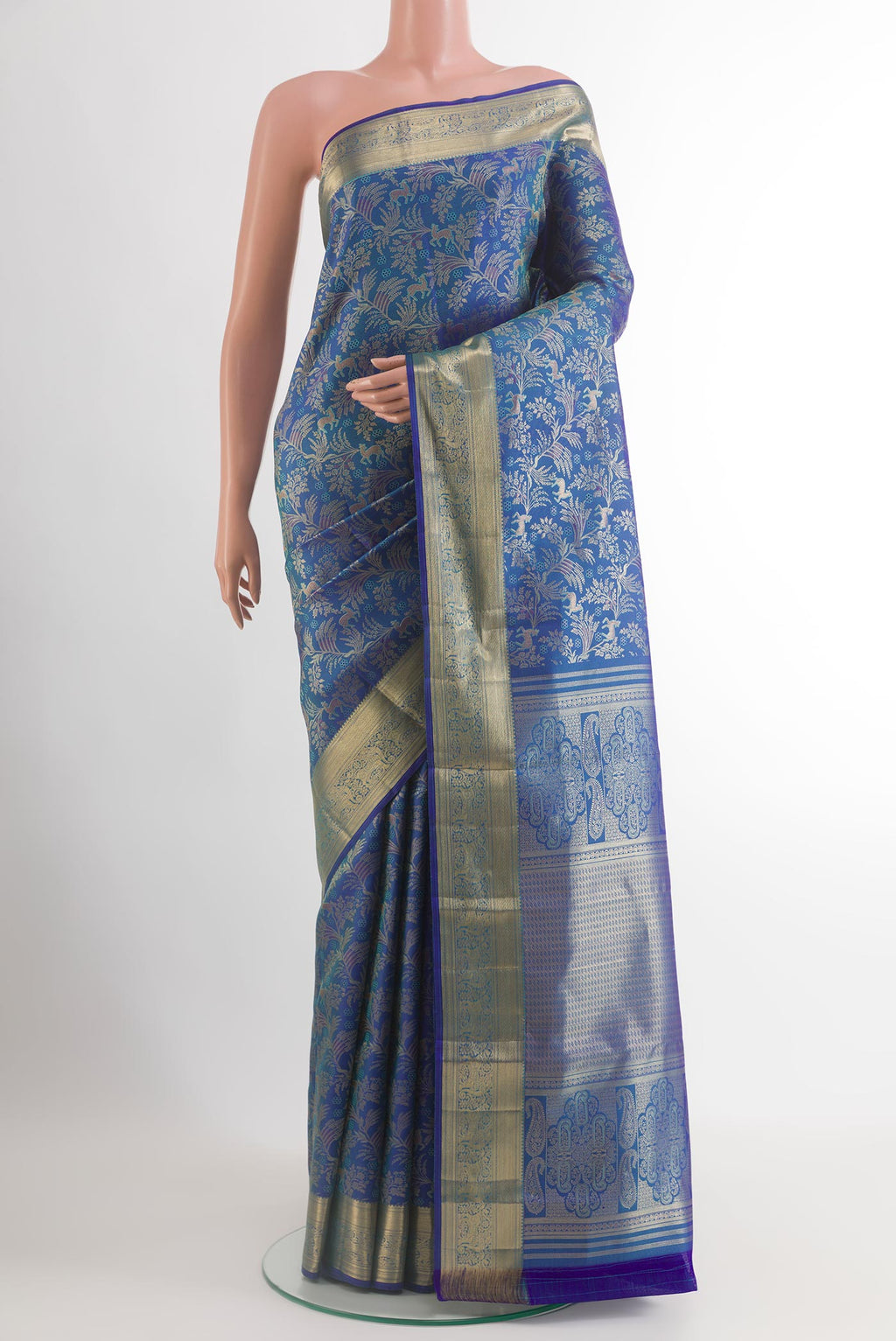 Royal Blue Kanjivaram Silk Saree with Zari Brocade on the body and Zari Border.  displayed on a mannequin