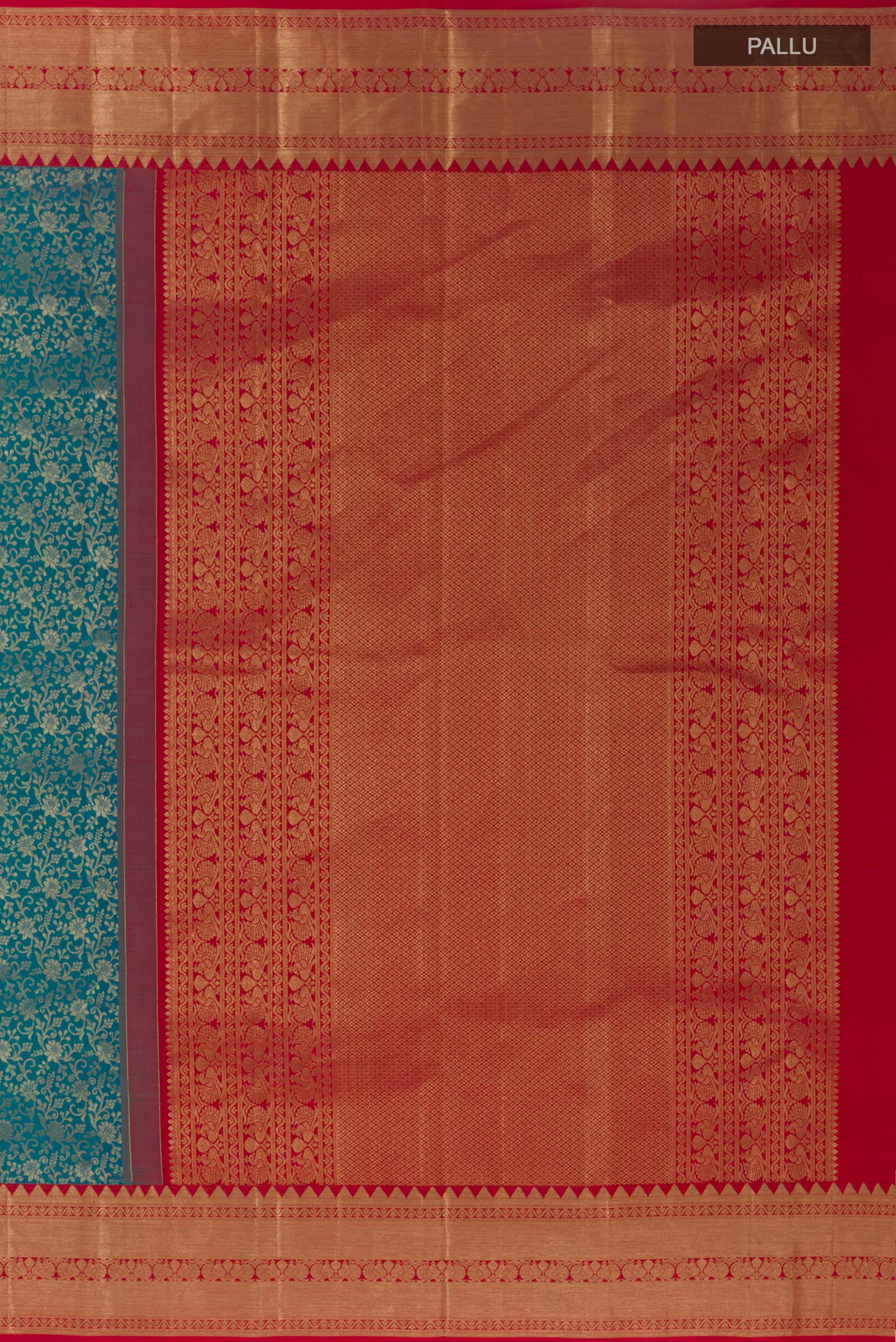 Close up image of the pallu of Blue Kanchipuram Silk Saree with Zari Brocade on the body and Zari Border. 