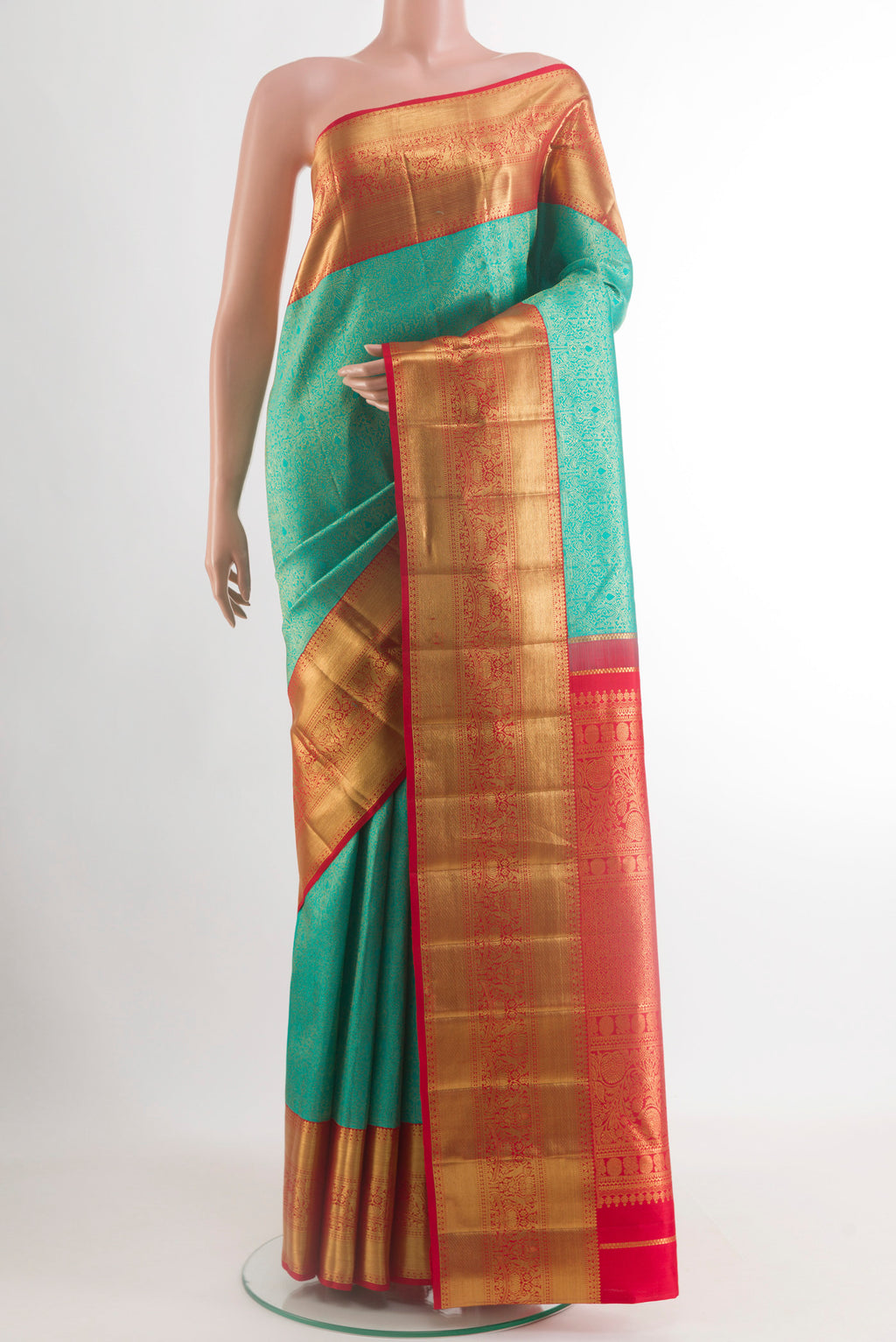 Sea Green Kanchipuram Silk Saree with Zari Brocade on the body and Zari Border.  displayed on a mannequin