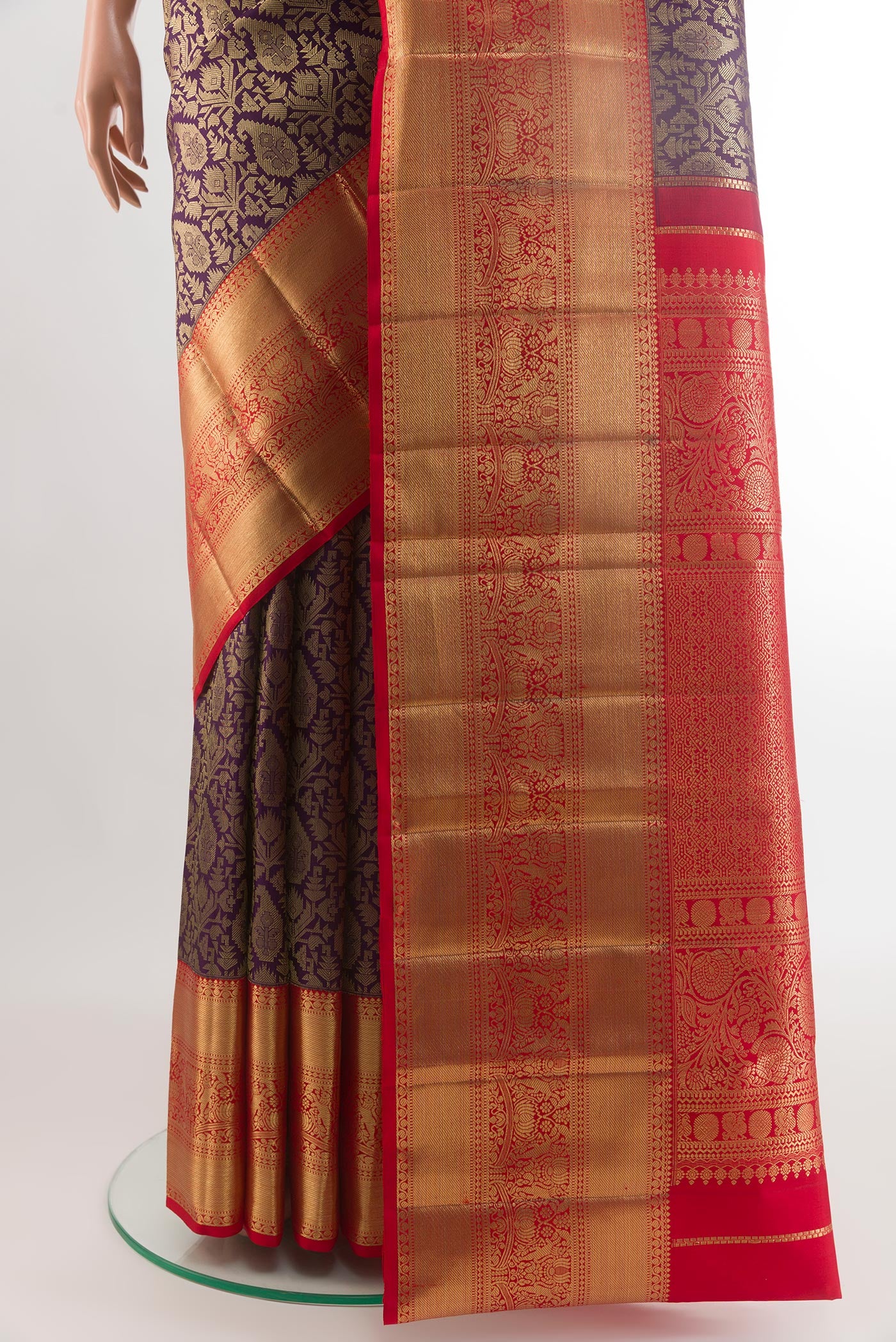 Pleats and pallu of Purple Kanchipuram Silk Saree with Zari Brocade on the body and Zari Border. 