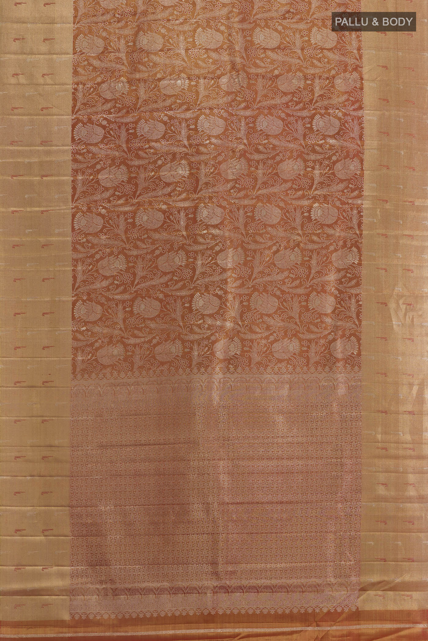 Flat view of Rust Kanjivaram Tissue Silk Saree with Zari Brocade on the body and Zari Border. 