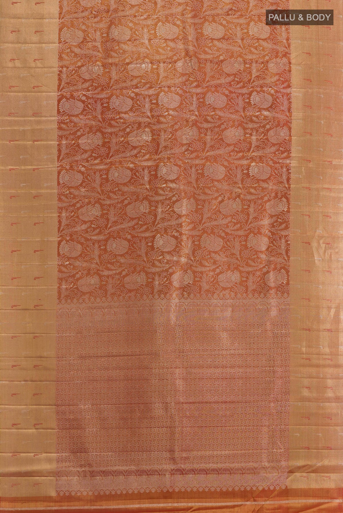 Flat view of Rust Kanjivaram Tissue Silk Saree with Zari Brocade on the body and Zari Border. 