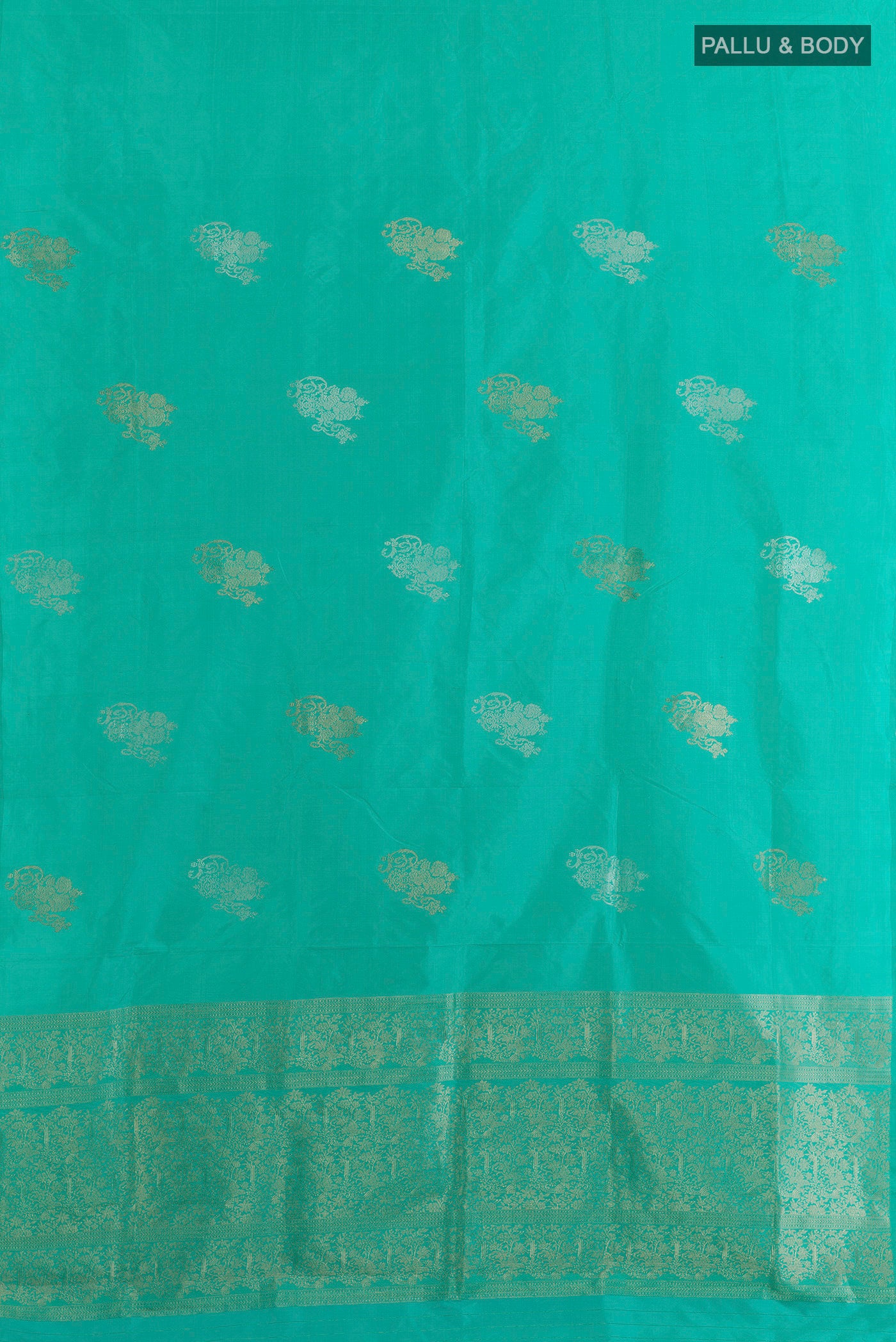 Flat view of Turquoise Banarasi Katan Silk Saree with Zari Butta on the body and Without Border. 