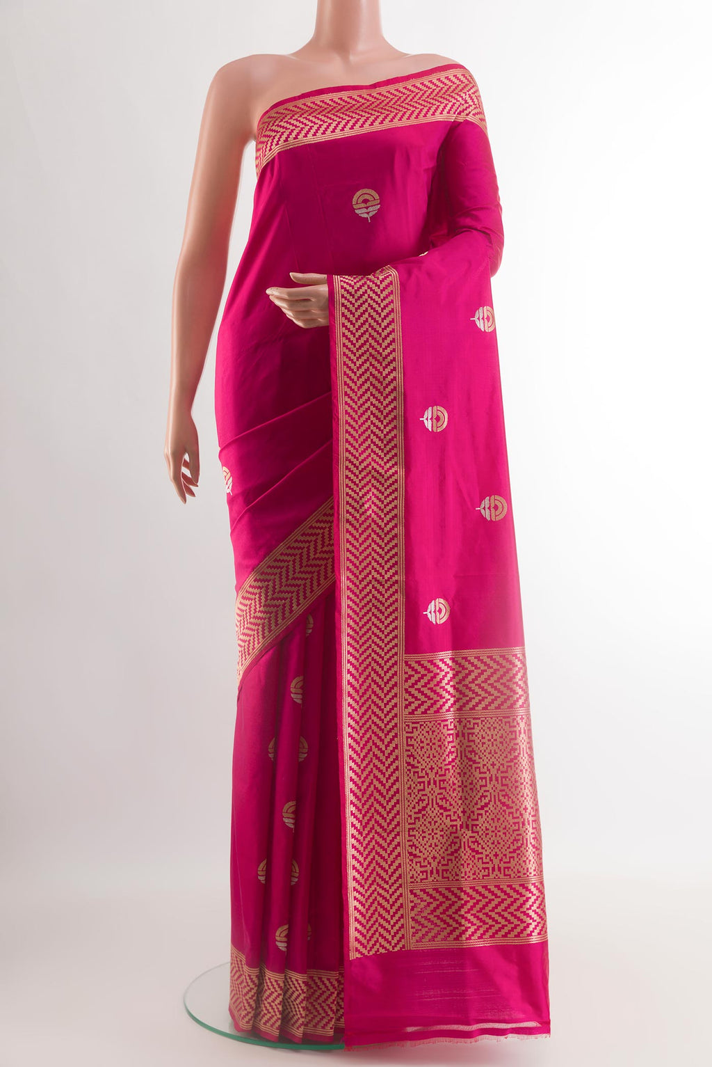 Pink Banarasi Katan Silk Saree with Zari Butta on the body and Zari Border.  displayed on a mannequin