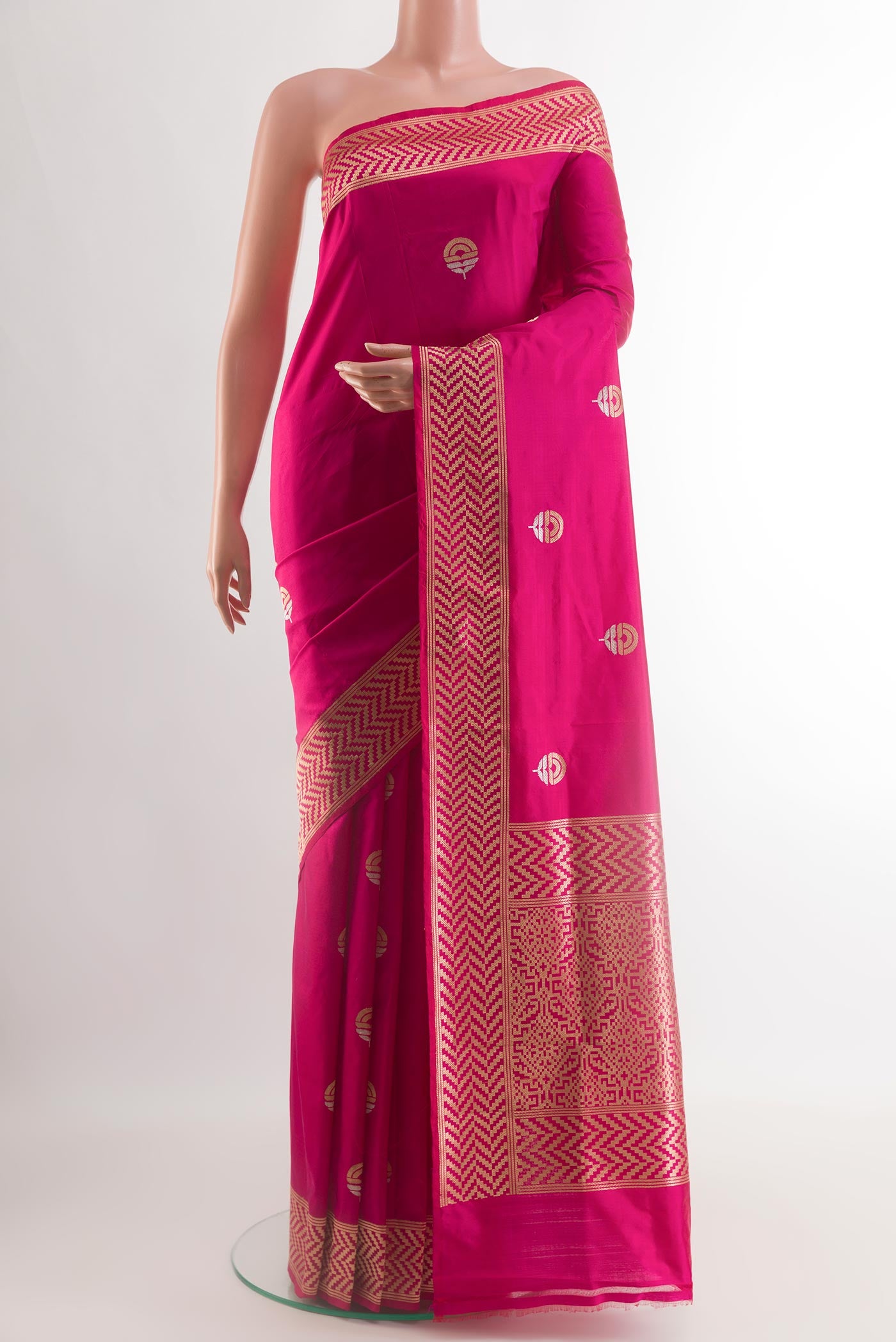 Pink Banarasi Katan Silk Saree with Zari Butta on the body and Zari Border.  displayed on a mannequin