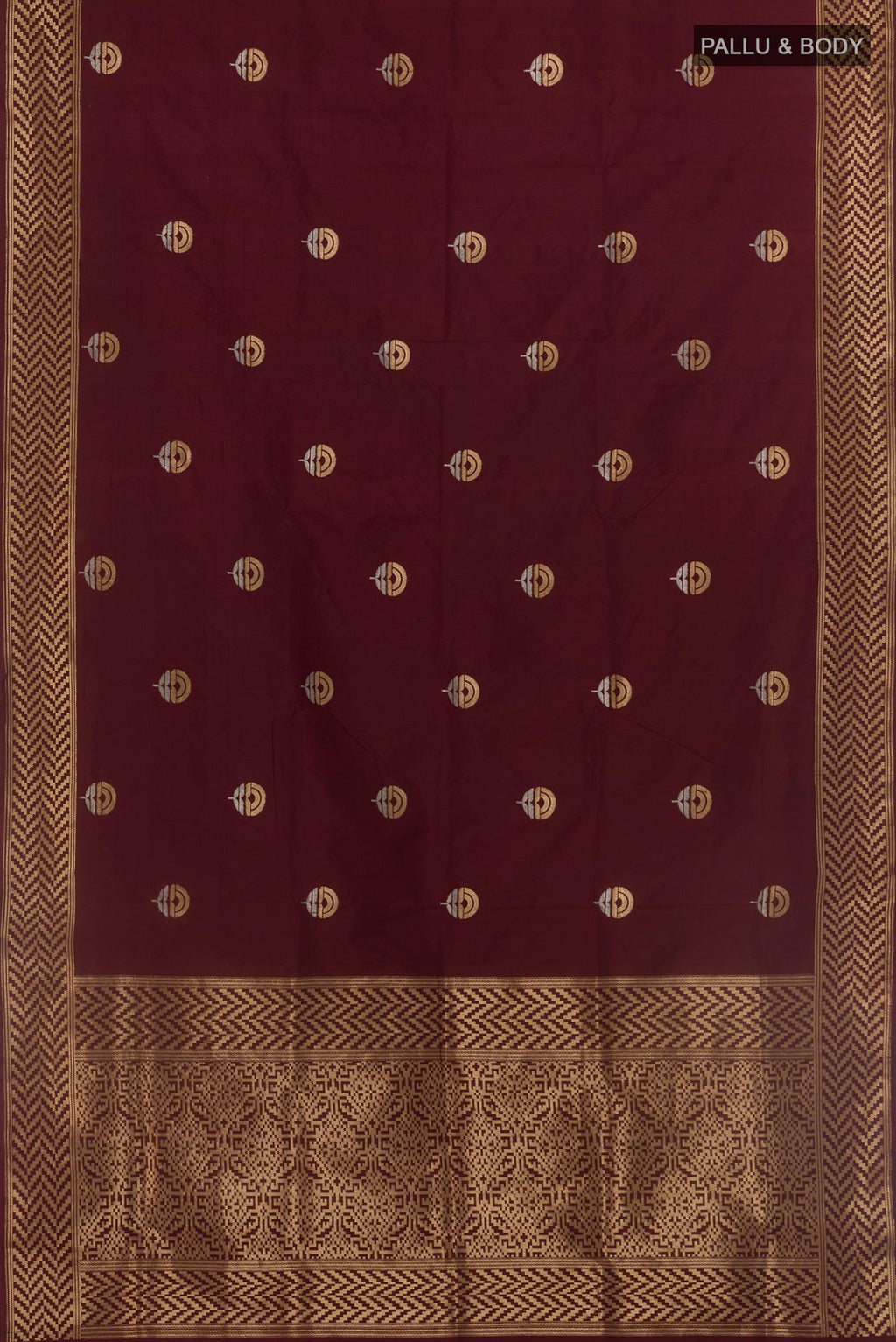 Flat view of Brown Banarasi Katan Silk Saree with Zari Butta on the body and Zari Border. 