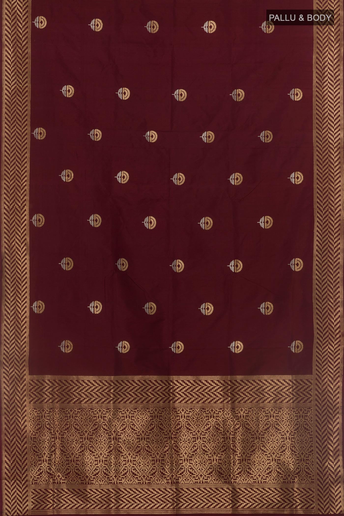 Flat view of Brown Banarasi Katan Silk Saree with Zari Butta on the body and Zari Border. 