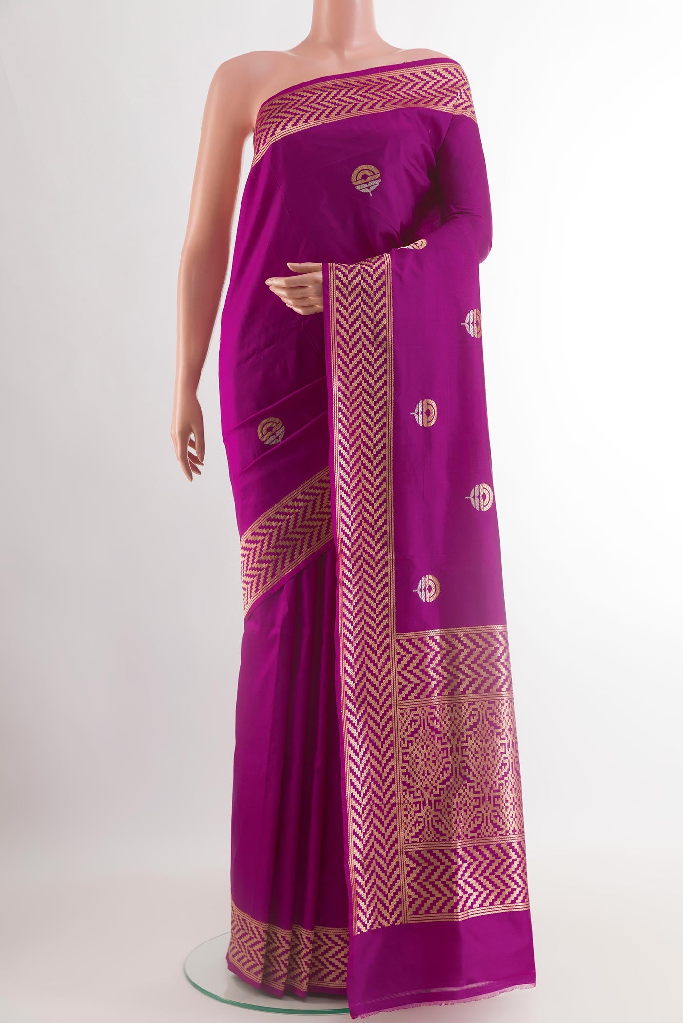 Purple Banarasi Katan Silk Saree with Zari Butta on the body and Zari Border.  displayed on a mannequin