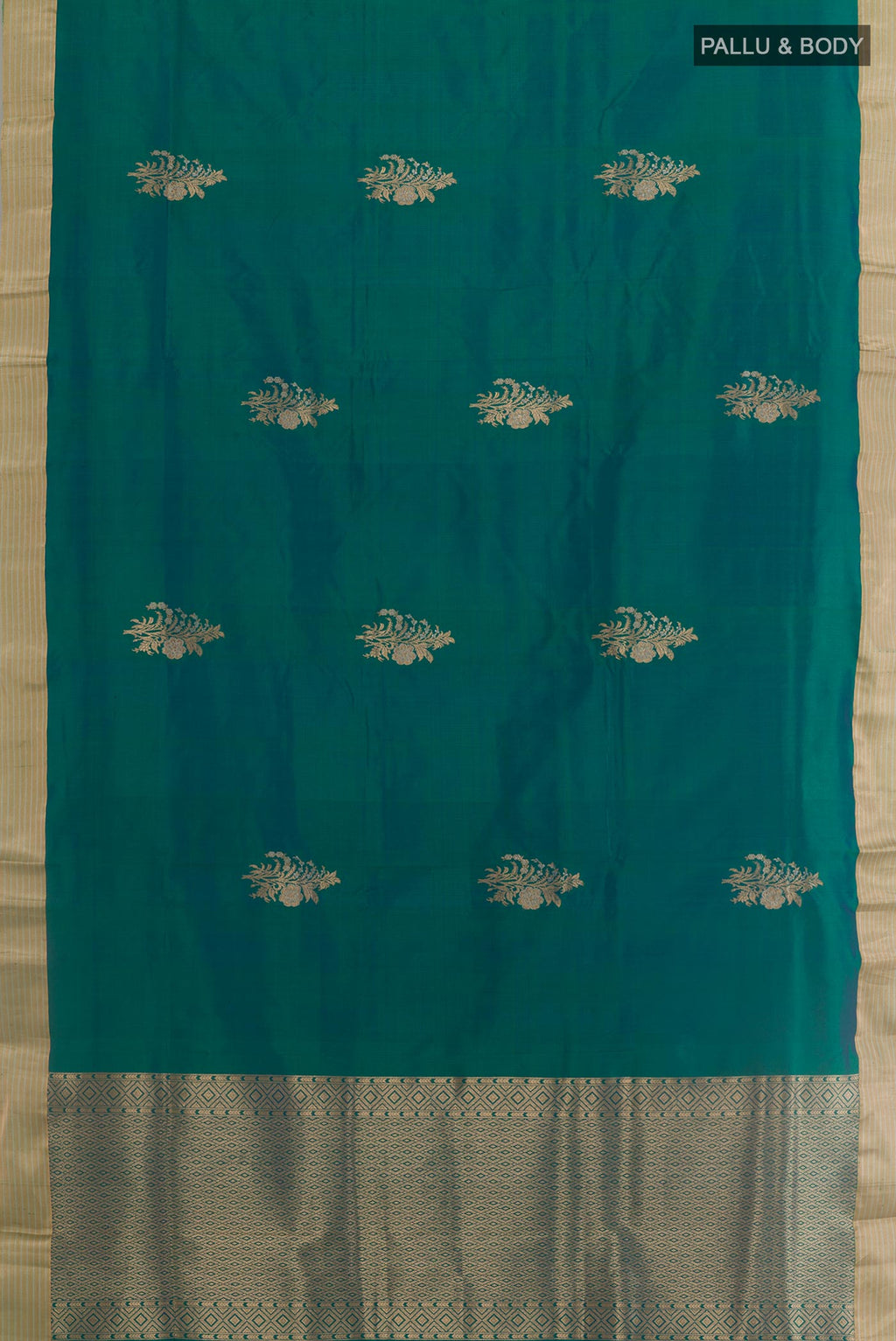 Flat view of Peacock Blue Banarasi Katan Silk Saree with Zari Butta on the body and Zari Border. 