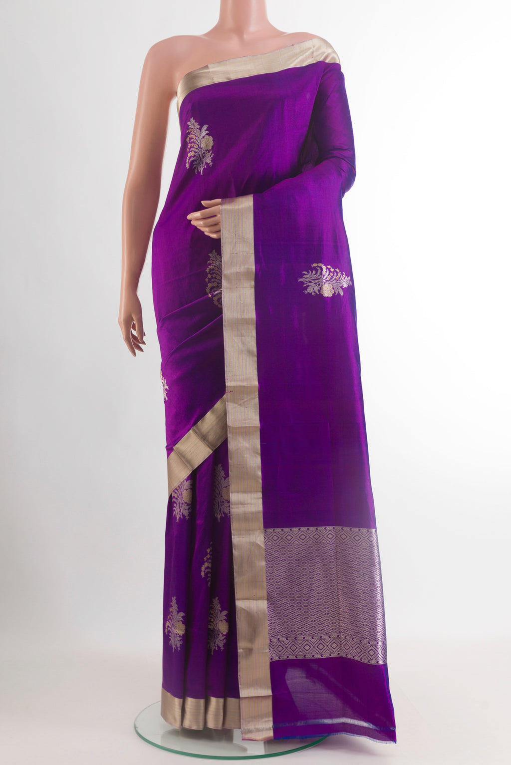 Purple Banarasi Katan Silk Saree with Zari Butta on the body and Zari Border.  displayed on a mannequin