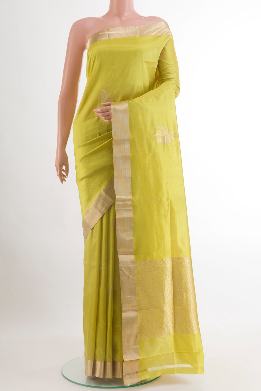 Yellow Banarasi Silk Saree with Zari Butta on the body and Zari Border.  displayed on a mannequin