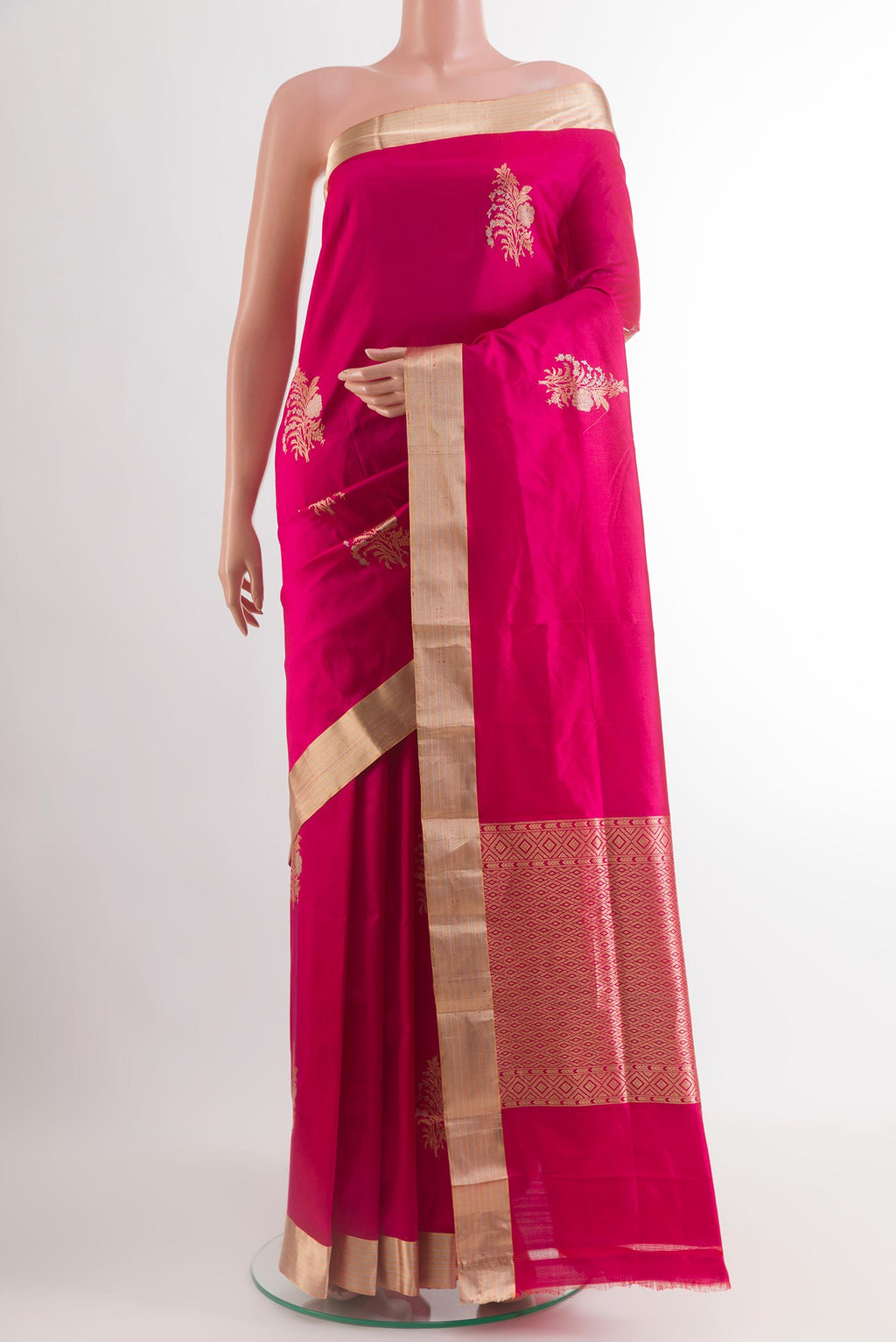 Pink Banarasi Silk Saree with Zari Butta on the body and Zari Border.  displayed on a mannequin