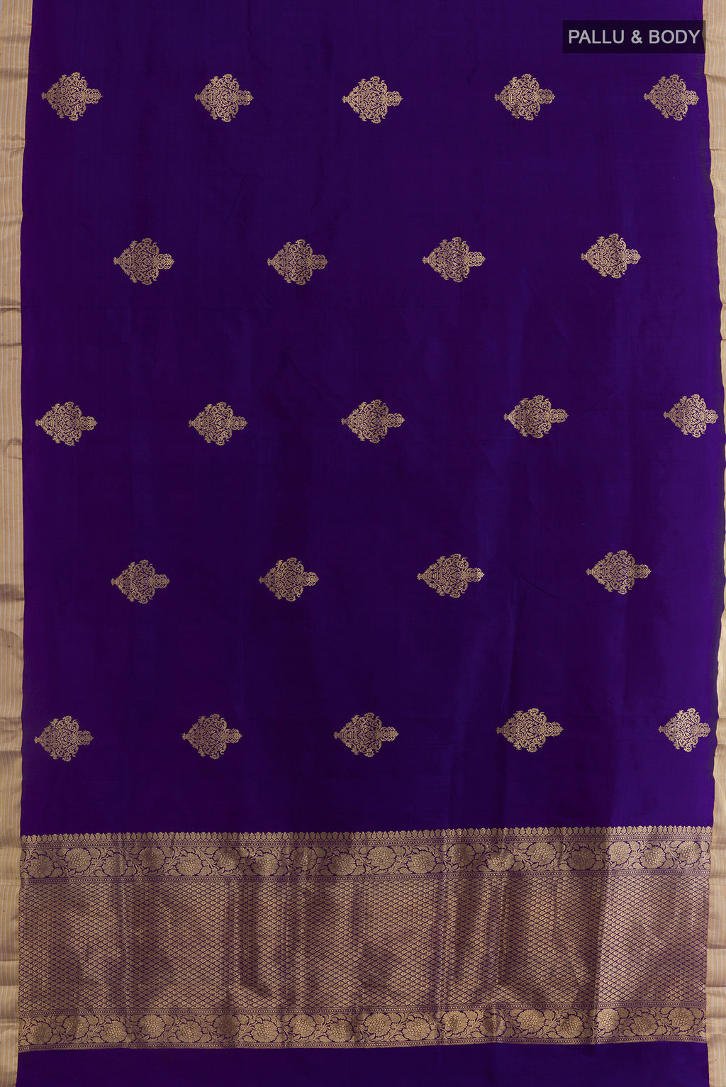Flat view of Blue Banarasi Silk Saree with Zari Butta on the body and Zari Border. 