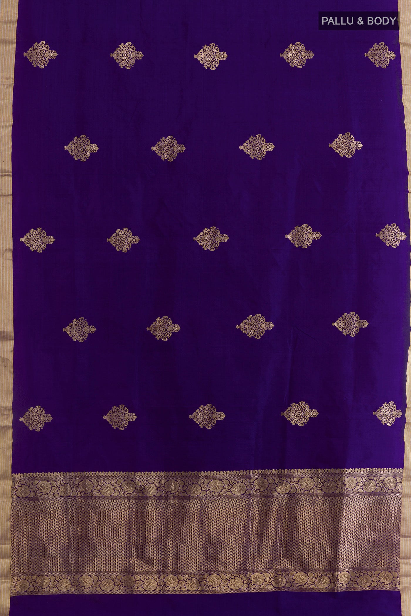 Flat view of Blue Banarasi Silk Saree with Zari Butta on the body and Zari Border. 