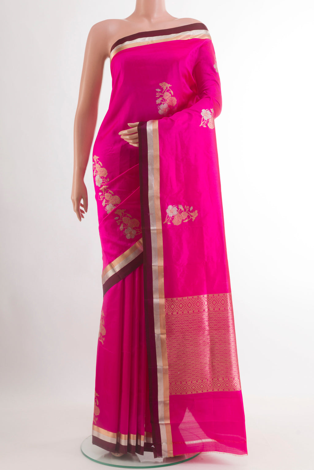 Pink Banarasi Silk Saree with Zari Butta on the body and Zari Border.  displayed on a mannequin