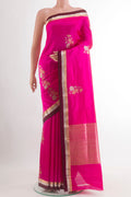 Pink Banarasi Silk Saree with Zari Butta on the body and Zari Border.  displayed on a mannequin