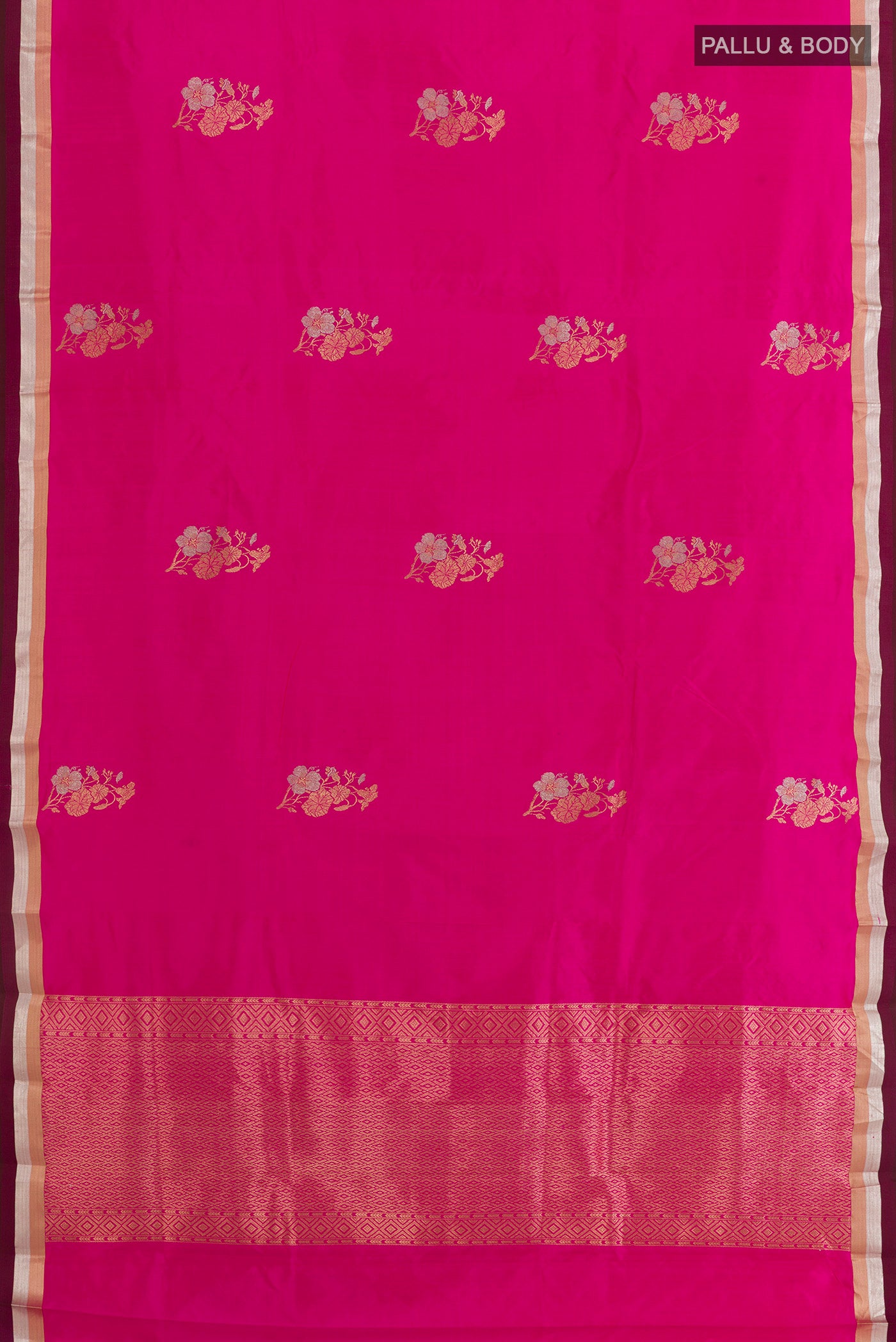 Flat view of Pink Banarasi Silk Saree with Zari Butta on the body and Zari Border. 