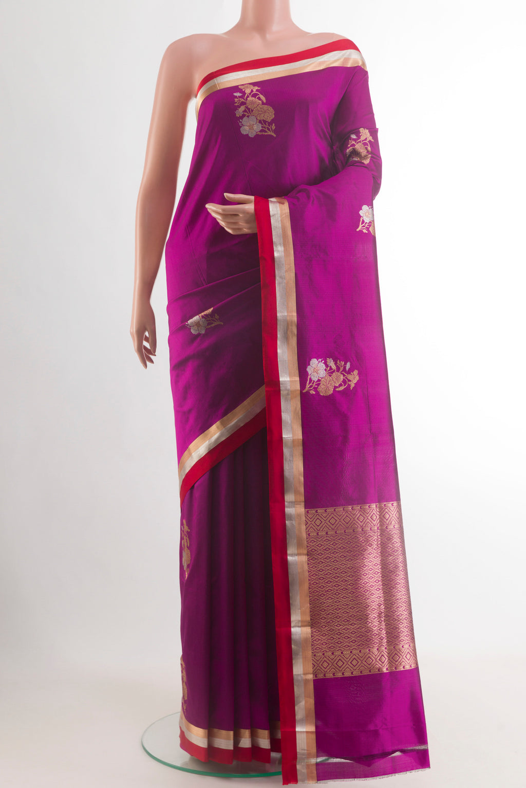 Purple Banarasi Katan Silk Saree with Zari Butta on the body and Zari Border.  displayed on a mannequin