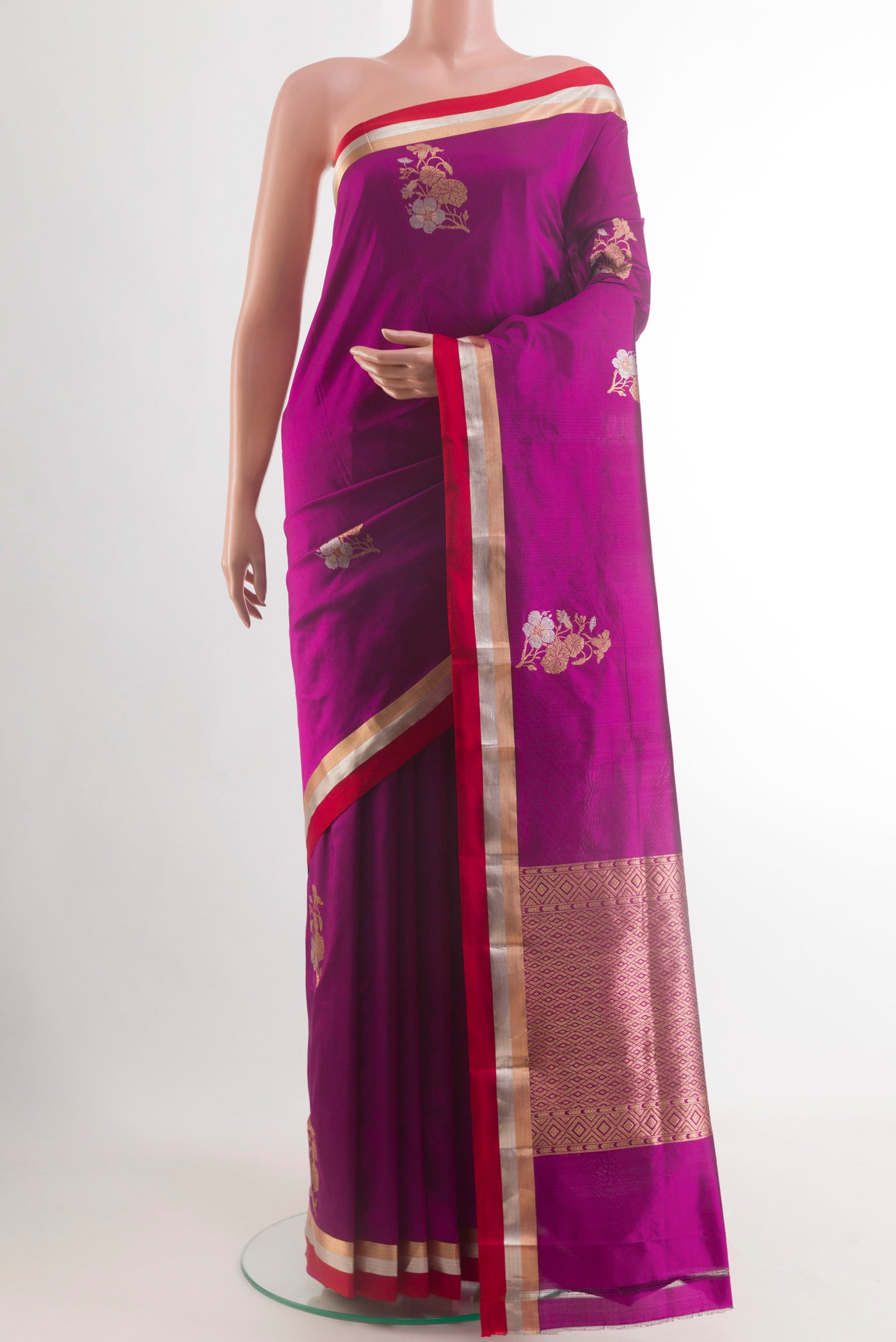 Purple Banarasi Katan Silk Saree with Zari Butta on the body and Zari Border.  displayed on a mannequin