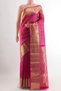 Rani Pink Kanchipuram Silk Saree with Zari Brocade on the body and Zari Border.  displayed on a mannequin