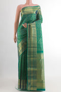 Green with Blue Color Kanchipuram Silk Saree with Zari Brocade on the body and Zari Border.  displayed on a mannequin